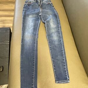 Blue Skinny Jeans with Distressing and Contrast Stitching